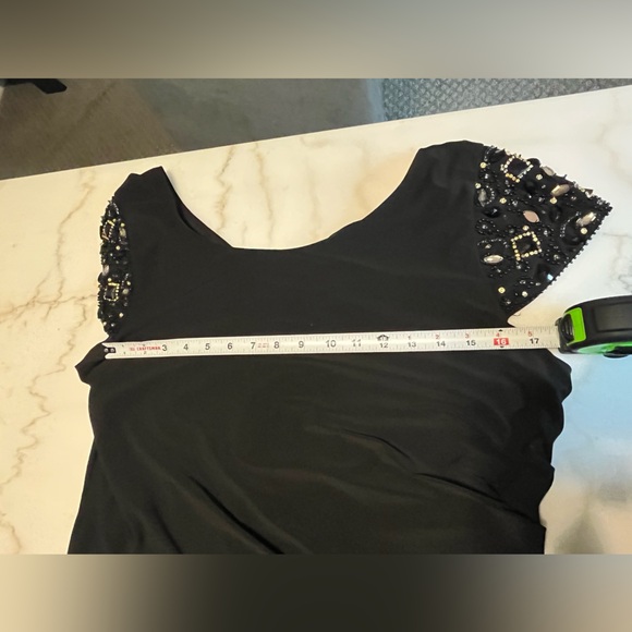 Elegant Black Dress with Embellished Sleeves - Picture 8 of 10